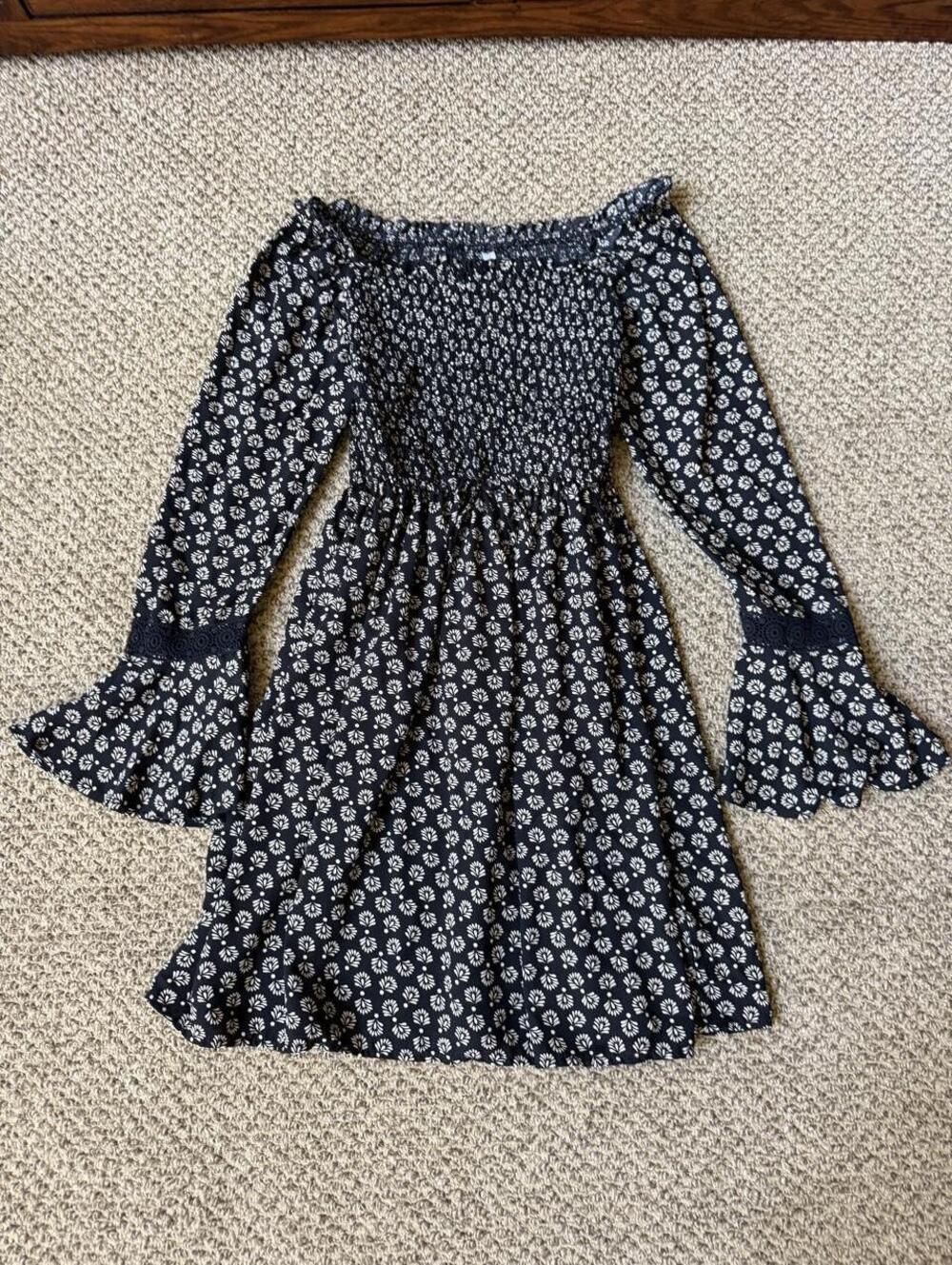 white & black off the shoulder floral mini dress with bell sleeves